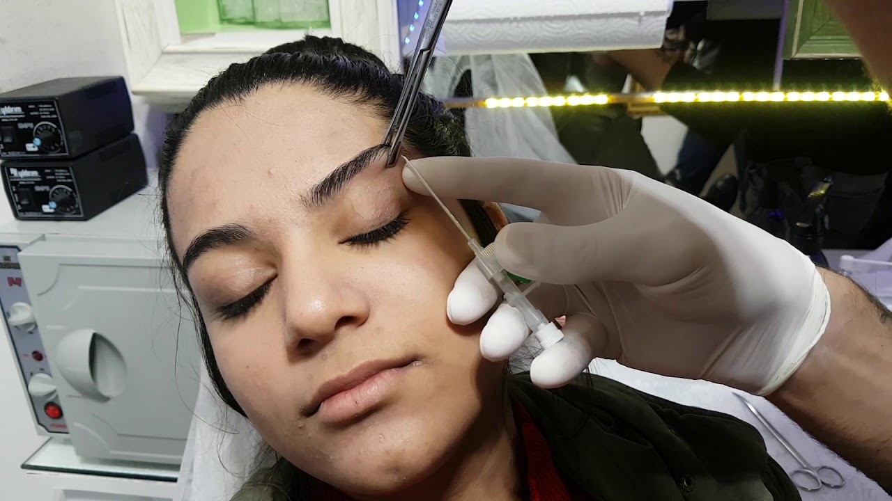EYEBROW PIERCING PROCESS