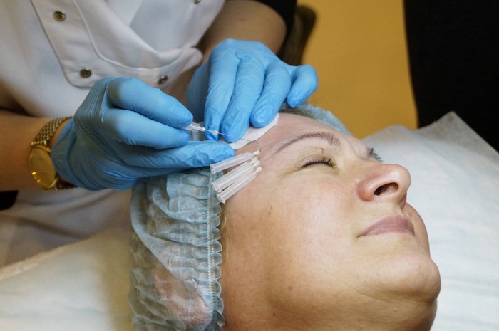 Review of non surgical and surgical methods of forehead lift and brow lift